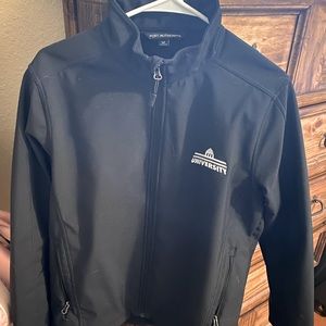 soft shell jacket/felt material on inside/ 2 pockets on inside and outside